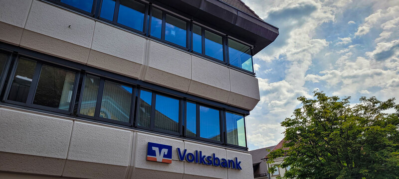 The Volksbank branch in the center of a city. In the background - the sky with light clouds. The Volksbank Group is a cooperative bank in Austria. July 7, 2024. Uberlingen, Germany.