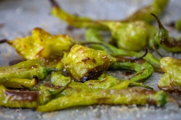 Mix of green peppers Shishito pepper Capsicum Annuum japonsea, or Japanese sweet pepper, not spicy and very tasty and Cambuci pepper Capsicum baccatum, green bell-shaped pepper