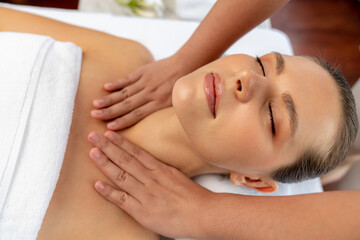 Caucasian woman customer enjoying relaxing anti-stress spa massage and pampering with beauty skin...