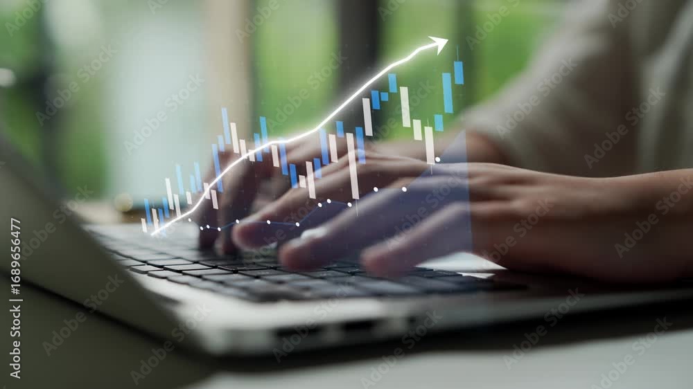 Aufkleber close-up of hands typing on a laptop as financial charts and graphs overlay illustrate growth trends