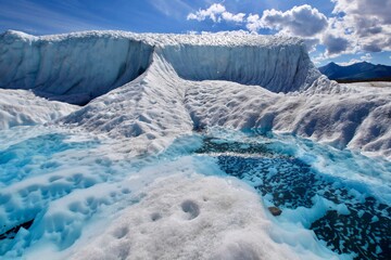 Stunning glacier ice pool with vivid blue tones