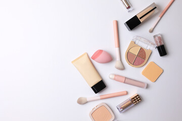 cosmetic makeup products ideal for beauty lovers. Top view on bright background