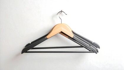 Wooden clothes hangers on a wall