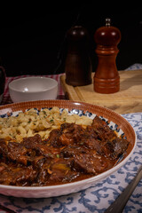 Hungarian goulash with spaetzle: savory beef stew and egg noodles dish