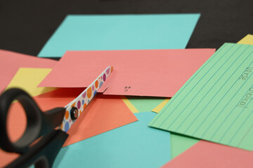 school scissors cutting colored paper