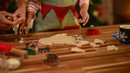 Family baking christmas cookies together - Powered by Adobe