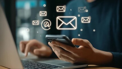 Checking messages on smartphone while focusing on laptop in a modern workspace, sharing the digital communication experience - Powered by Adobe