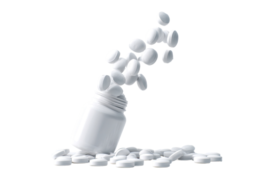 A white plastic medicine bottle, tipped over, disperses round pills into the air and onto a surface