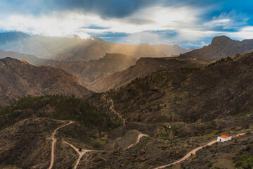 The sun breaking through the clouds in the mountains of Gran Canaria