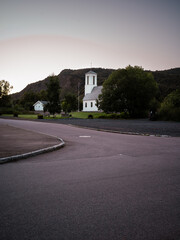 Church of Melbu from a distance in the street