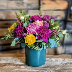 Vibrant Purple Pink Yellow Dahlia Flower Arrangement in Teal Vase