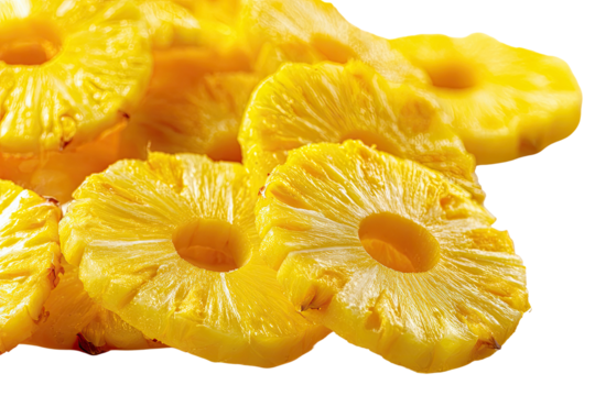 Close-up of many sliced pineapple rings.  Bright yellow,  circular slices stacked, showing a  light-colored center hole.  Fresh,  delicious, tropical fruit