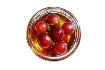 Red grapes in a clear glass jar
