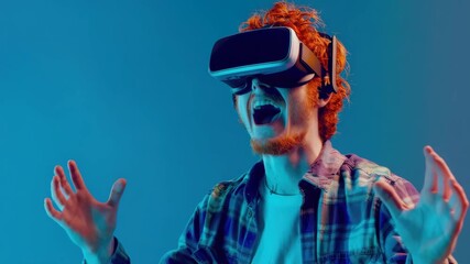 Excited man wearing VR headset, arms wide open, expressing enjoyment of virtual worlds and immersive experiences.