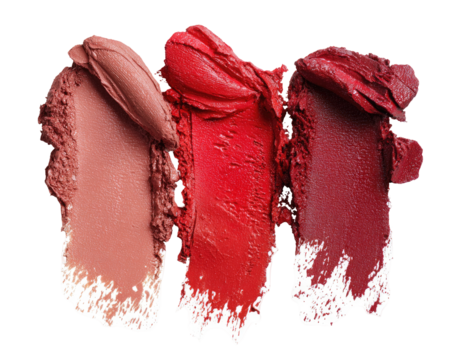 Three swatches of lipstick in varying shades of red and beige, smudged and textured