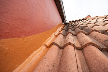Waterproofing existing roof with sealant creating durable surface