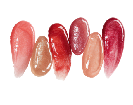 Lip gloss swatches in various shades of pink and red