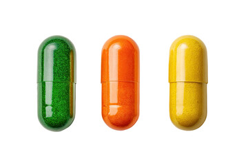Three capsules, green, orange, and yellow, in a horizontal row, against a black background.  Each capsule is filled with a visible powder