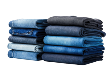 Stacks of folded denim jeans in various shades of blue