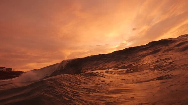 Slow motion video of a wave rising at sunrise, captured at Bronte Beach in Sydney, Australia.