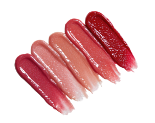 Colorful lip gloss swatches in varying shades of pink and red