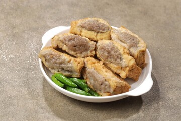 Tahu bakso is a food made from tofu filled with meatballs in the middle.