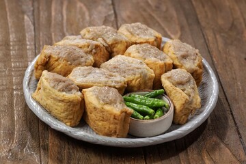 Tahu bakso is a food made from tofu filled with meatballs in the middle.