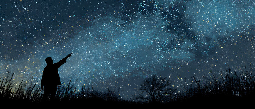 Silhouette of a man pointing at the starry night sky in a field, gazing at the Milky Way with wonder and awe, creating a sense of cosmic connection.