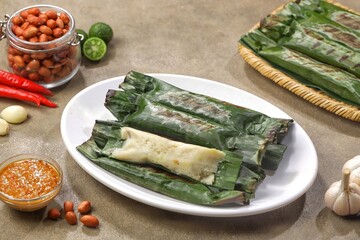 Fish otak-otak is a food preparation in the form of fish meat dough mixed with spices, then wrapped...