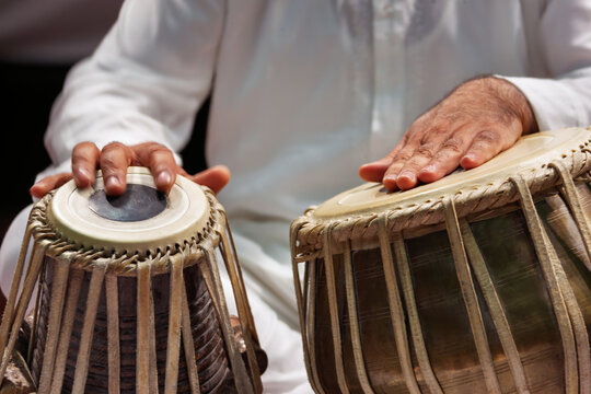 Hindustani Classical Music, indian tabla drums percussion instrument, close up on hands