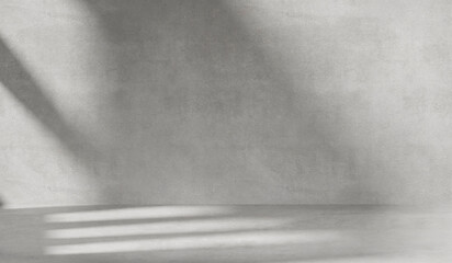 Gray background with cement wall texture. Minimalist abstract background for product presentations with soft shadows from the window