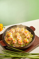 Steamed shrimp meat and seasonings on the table, steaming dish