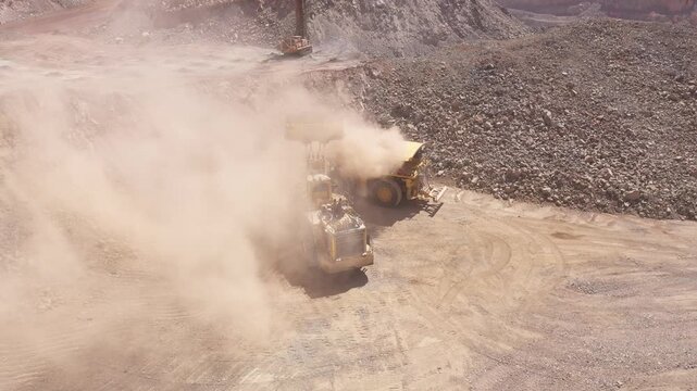 Mining Haul Trucks Operating and Loading in Open Pit Mine Chile
