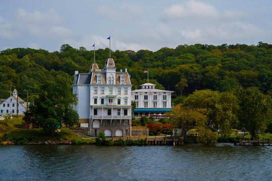 Connecticut River Autumn Landscape with the view of landmark architectures on the woodland hill, a tranquil New England scenery