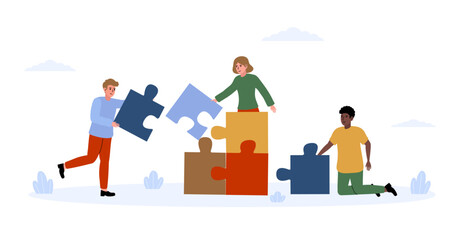 Group of friends assembling colorful puzzle pieces in a friendly collaboration outdoors