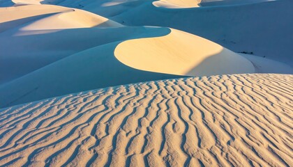 Aerial View of Beige Sand Dunes with Wavelike Ripples