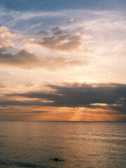 Dramatic Sunset Sky Over Calm Ocean Horizon