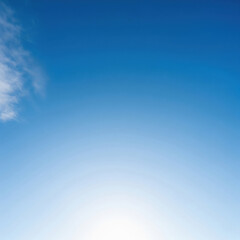 Obraz premium Clear Blue Sky with Soft Gradient and Minimal White Cloud