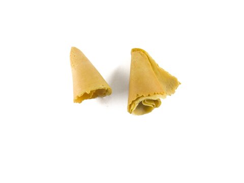 Semprong cake, sapit, sepit, Dutch cake, gapit, kassipi, kapit, Asian egg roll. A waffle or pastry snack originating from Indonesia. Semprong cake isolated on a white background.