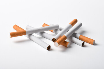 Pile of cigarettes isolated on white background