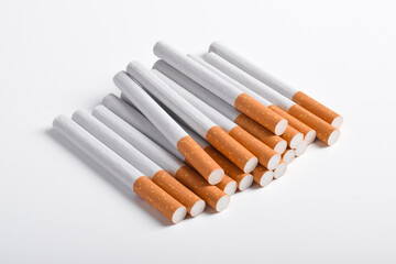 Pile of cigarettes isolated on white background