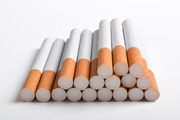 Pile of cigarettes isolated on white background