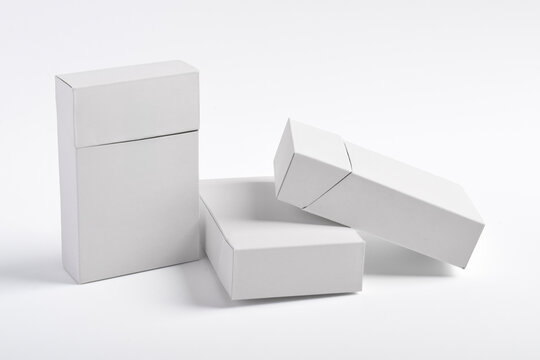 Three cigarette boxes or packs isolated on a white background. Clipping path. Template for your design.