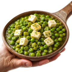 A traditional North Indian curry made with green peas and cottage cheese cubes (Matar Paneer)