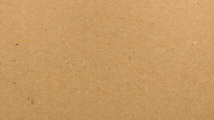 Background of brown kraft paper or cardboard texture, Abstract pattern of beige rough carton, old paper sheet, parchment or papyrus surface.
