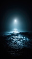 Moody ocean scene a bright moon shines on choppy, dark blue waves under a clouded sky. Water reflects the light, creating an ethereal, dramatic atmosphere