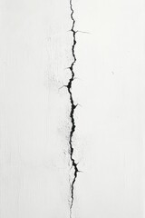 Fototapeta premium Vertical crack running through white textured wall surface with visible uneven edges and rough texture