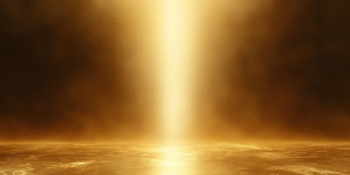 Bright golden vertical beam of light illuminating hazy golden mist over a shimmering reflective surface creating a mystical and serene atmosphere