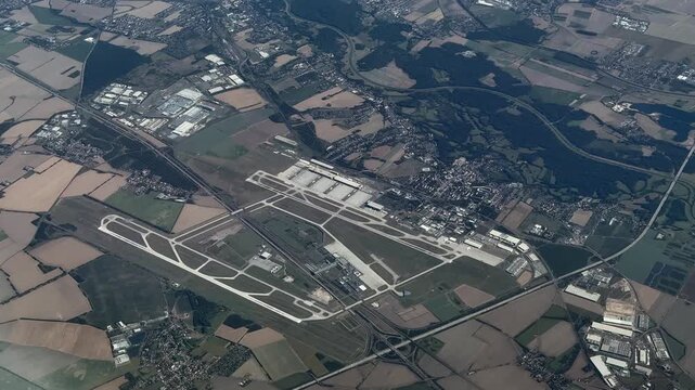 4k aerial video footage, overflying Leipzig/Halle Airport with runways, taxiways, aprons, hangars and other facilities. The airport is located near city of Leipzig in Saxony. 