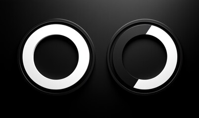 Two black circular dials with white progress indicators against a dark background, one dial fully lit and the other partially lit, conveying precision and control